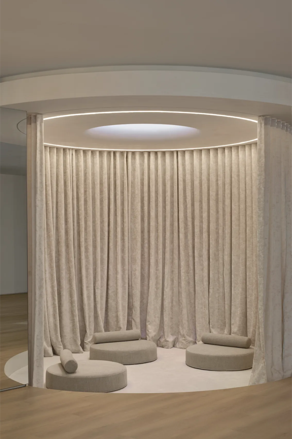 Circular meditation lounge with curtains